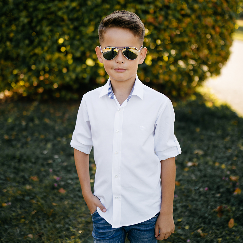 Boy wearing White Classic Cotton Shirt outdoors with sunglasses, casual rolled sleeves