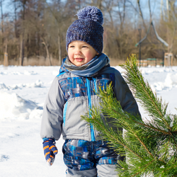 Toddler boy wearing Grey Blue Ski Set outdoors in snow