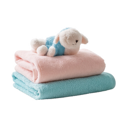 Baby towel set with pink and teal soft towels and a white lamb plush toy on top
