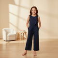 Girl wearing the navy jumpsuit